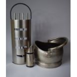 A Modern Aluminum Fire Companion Set Together with a Novelty Spill Vase and a Helmet Shaped Coal