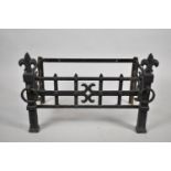 A Wrought Iron Fire Basket Surround, with Fleur De Lys Finials, 64cms Wide