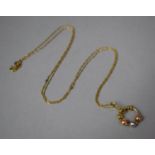 An 18ct Gold Italian Beaded Pendant and Necklace Chain. 2.5gms