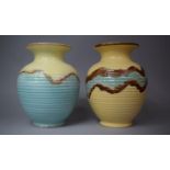 Two Mid 20th Century Glazed Vases of Ribbed Tapering Baluster form, 28cms High