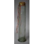 A Tall Cylindrical Green Glass Canister with Cork Stopper, 59cms High