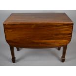 A Mahogany Drop Leaf Table on Reeded Square Tapering Support, 97cm wide