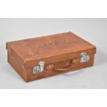 A Leather Suitcase Retailed by The Army & Navy Stores LTD Monogrammed J.R.K, 55.5cms Wide