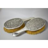 A Pair of Oriental White Metal Ladies Dressing Table Brushes Decorated in relief with Bamboo,