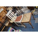 A Cane Seated Cabriole Supported Stool, together with Two Dining Chairs