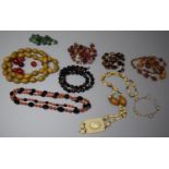 A Collection of Various Necklaces to Include Amber and Amber Style Beads, Glass, Yellow Metal and