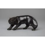 A Carved Horn Netsuke in the Form of a Lion, 6cm Long