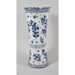 A Delft Blue and White Vase with Ribbed Body and Decorated with Flowers, Signed to Base, Chips to