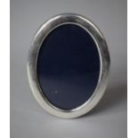 A Silver Mounted Oval Photo Frame, Sheffield 1968, 17cm high