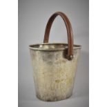 A Silver Plated Oval Wine or Ice Bucket, 24.5cm Wide with Leather Loop Carrying Handle