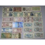 A Collection of Japanese, Hong Kong, Malaya and Nigeria Bank Notes