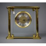 A Brass Mantle Clock by the London Clock Company, Quartz Movement, 17cm high