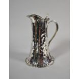 A Hukin & Heath Arts and Crafts Silver Plated Lidded Hot Water Jug, no.16296, 18cm high