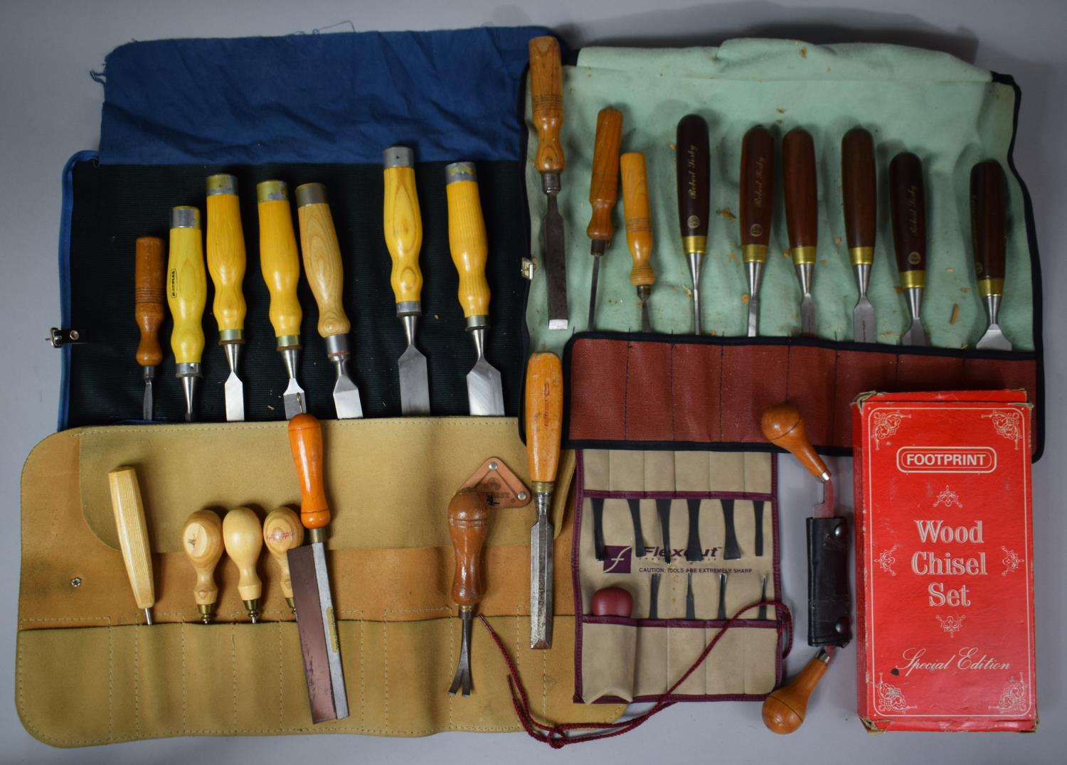 A Collection of Various Part Wooden Handled Chisel Sets