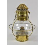 A Brass Oil Lamp with Loop Handle and Wedge Burner, Globular Shade, 27cm High