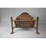 A Cast Iron Fire Basket with Acorn Finial and Claw Front Feet, 51cm wide