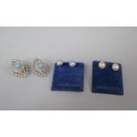 A Pair of Vintage Silver Earrings with Hinged Secret Compartments and Two Pairs of Pearl Earrings