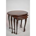 A Mid 20th Century Oval Mahogany Nest of Three Tables, Longest 58cm wide