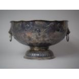A Silver Plated Punch Bowl with Repousse Swag Decoration and Lion Mask and Ring Handles, 32cm