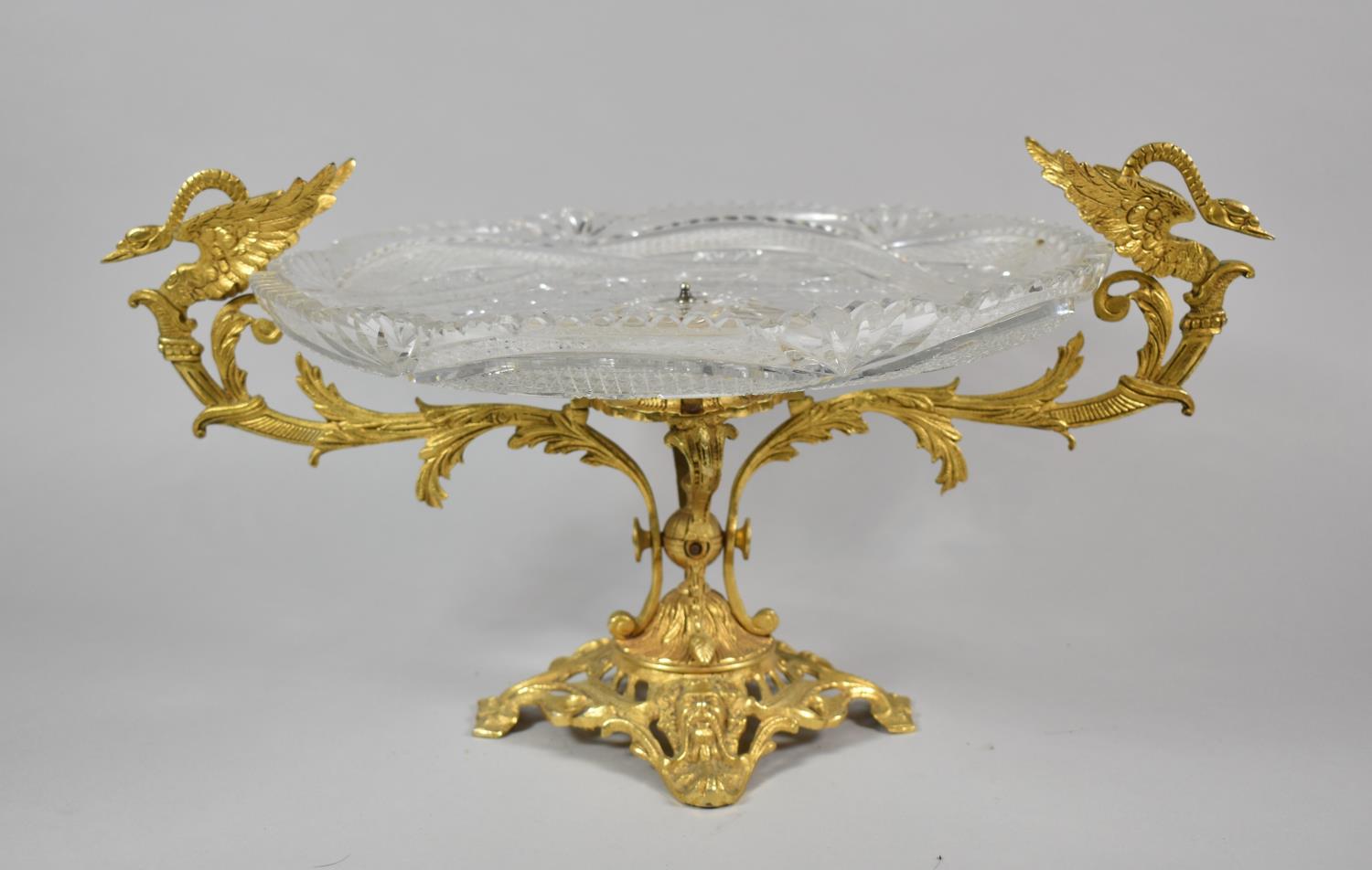 A Continental Gilt Metal and Cut Glass Table Centre Bowl with Stylised Swan Handles, Art Nouveau