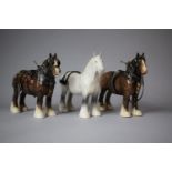 A Beswick Grey Shire and Two Other Horses in Harness