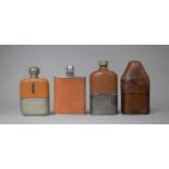 A Collection of Four Vintage Leather Mounted Hip Flasks