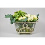 A Reproduction French Style Oval Glass Planter with White Metal Surround and Containing Artificial