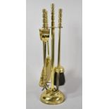 A Brass Fire Companion Set, 46cm high