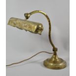 A Vintage Brass Desk Lamp with Circular Weighted Base