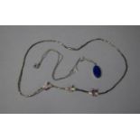 Two Silver Chains with Mother of Pearl Flower Pendants and Lapis Lazuli Oval