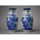 A Pair of Small Oriental Blue and White Floral Decorated Vases with Handled in the Form of Elephants