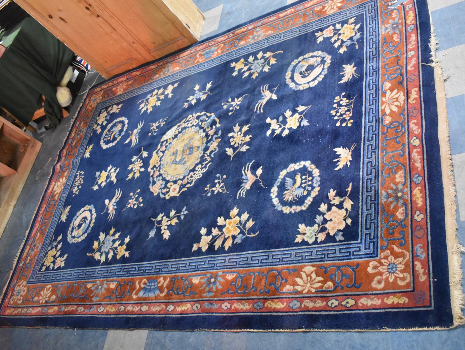 A Patterned Woollen Carpet Square on Blue Ground, AF, 300x213cm