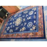 A Patterned Woollen Carpet Square on Blue Ground, AF, 300x213cm