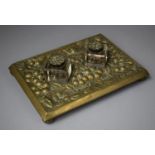 An Early 20th Century Brass Desk Top Inkstand with Two Ink Bottles, Both Brass Hinged Lids Loose,