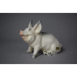 A Beswick Seated Pig, Model no.832