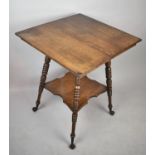 A Nice Quality Edwardian Oak Square Topped Occasional Table with Turned Supports Culminating in Claw