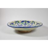 A Continental Faience Bowl in Blue and Green Glaze, 34.5cm Diameter