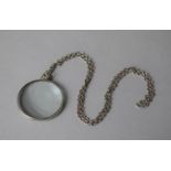 A Silver Mounted Magnifying Glass on 24" Silver Chain