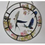 A Stained Glass Hanging Rondel Decorated with Swallows, 19.5cm Diameter