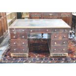 A 19th Century Mahogany Kneehole Writing Desk with Three Drawers Under Rexine Inlaid Top, Two