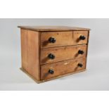 A Late 19th Century Stripped Pine Three Drawer Collectors Cabinet with Turned Handles. 36cm wide