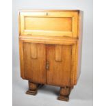 An Oak Art Deco Fall Front Hall Bureau with Fitted Interior and Cupboard Base, 75cm Wide