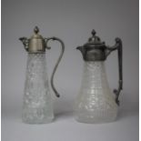 Two Silver Plate Mounted Moulded Glass Claret Jugs