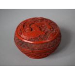 A Cinnabar Lacquer Circular Lidded Pot Detected in Relief with Figures Under Tree, 9.5cm Diameter