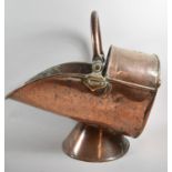 A Late 19th Century Copper Helmet Shaped Coal Scuttle with Looped Carrying Handle, 43cm Long