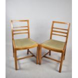 A Pair of Vintage Ladder Back Dining Chairs with Pad Seats