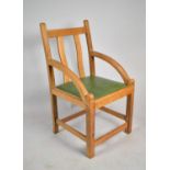 An Arts and Crafts Influenced Oak Armchair