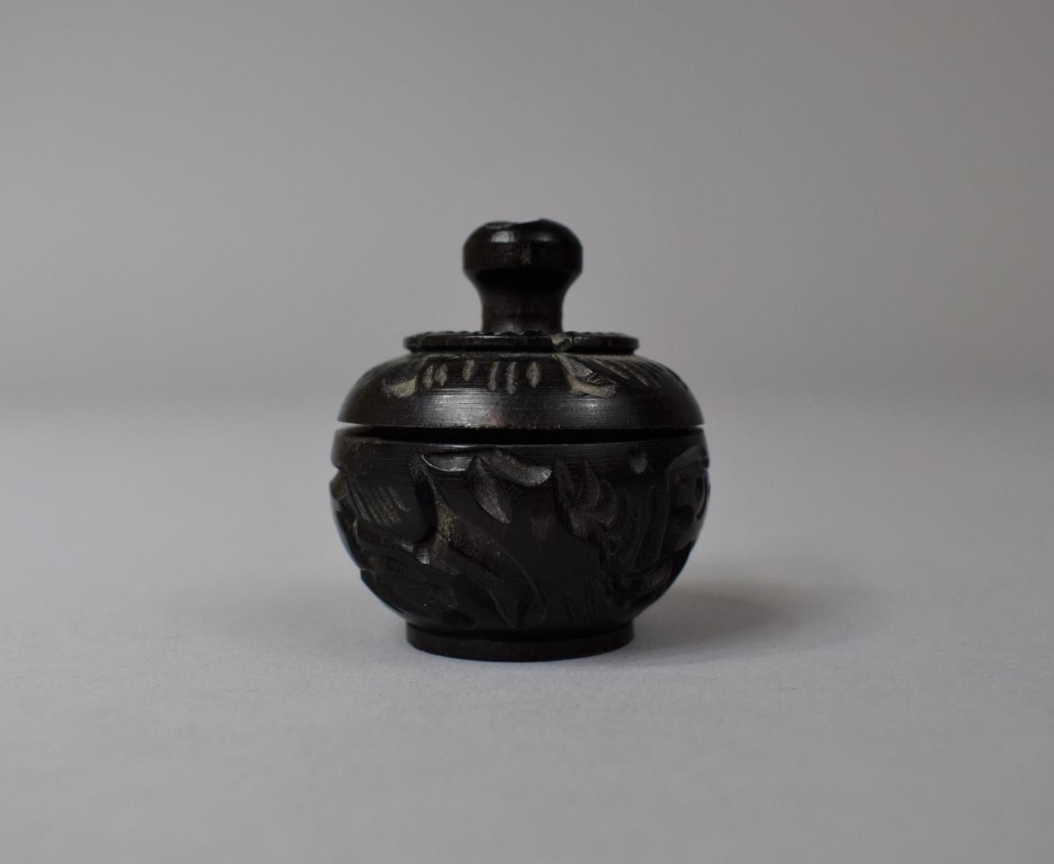 A Small Carved Globular Box, 4.5cm high