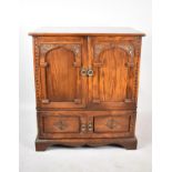 A Mid 20th Century Oak TV Cabinet with Panelled Doors, Suitable for Conversion to Cocktail