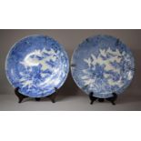 A Pair of 19th Century Japanese Blue and White Chargers, Decorated with Exterior Scene and Geometric